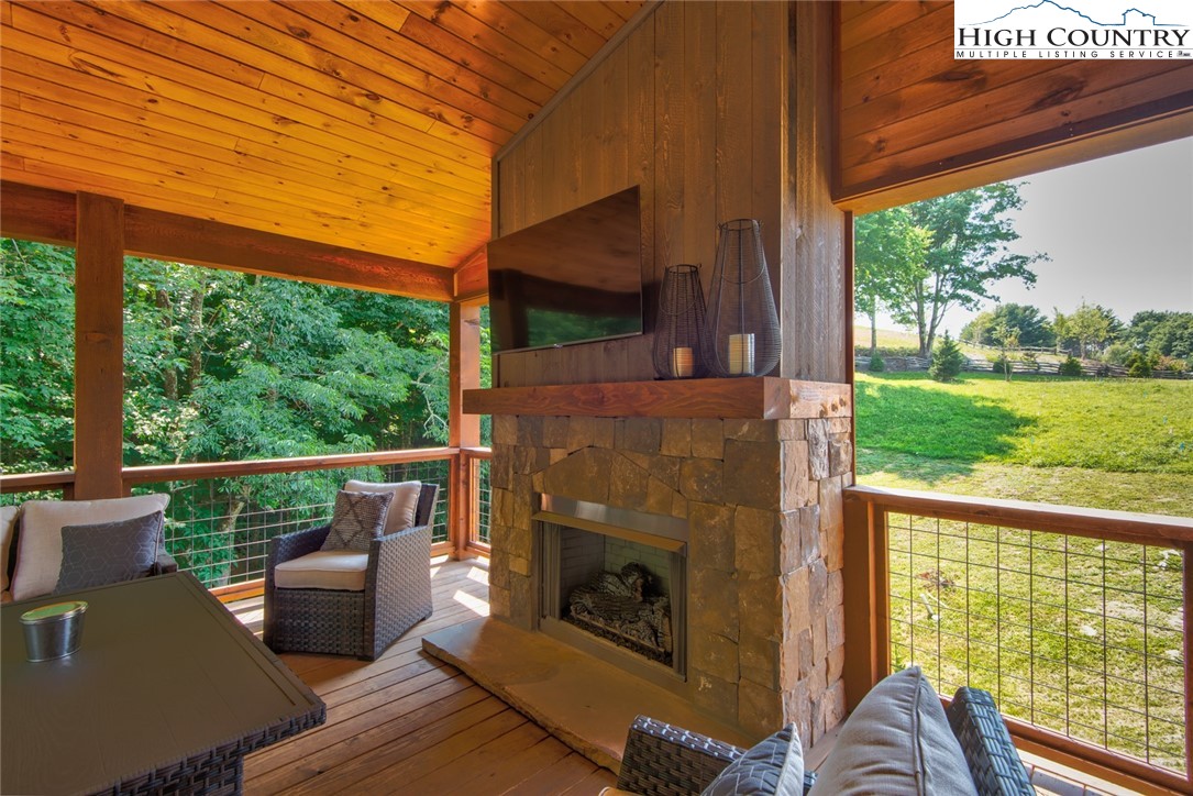 273 High Country Overlook Banner Elk, NC 28604 - Photo 40 of 50 a outdoor living space with furniture and garden view