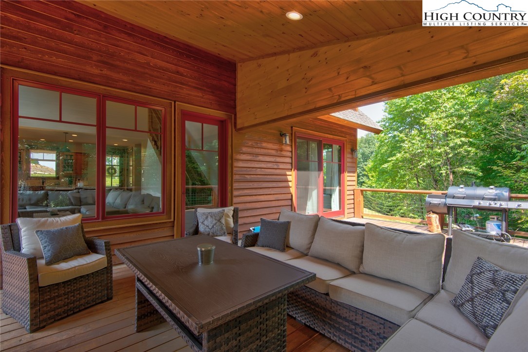 273 High Country Overlook Banner Elk, NC 28604 - Photo 41 of 50 a outdoor living space with patio furniture and garden view