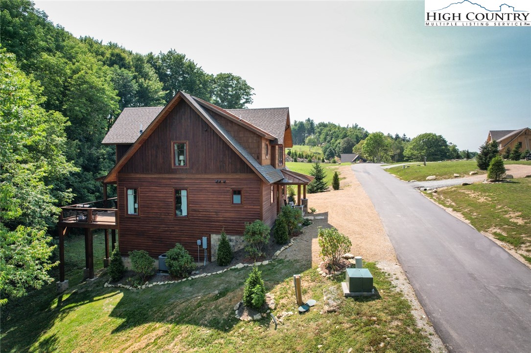 273 High Country Overlook Banner Elk, NC 28604 - Photo 48 of 50 a front view of a house with a yard