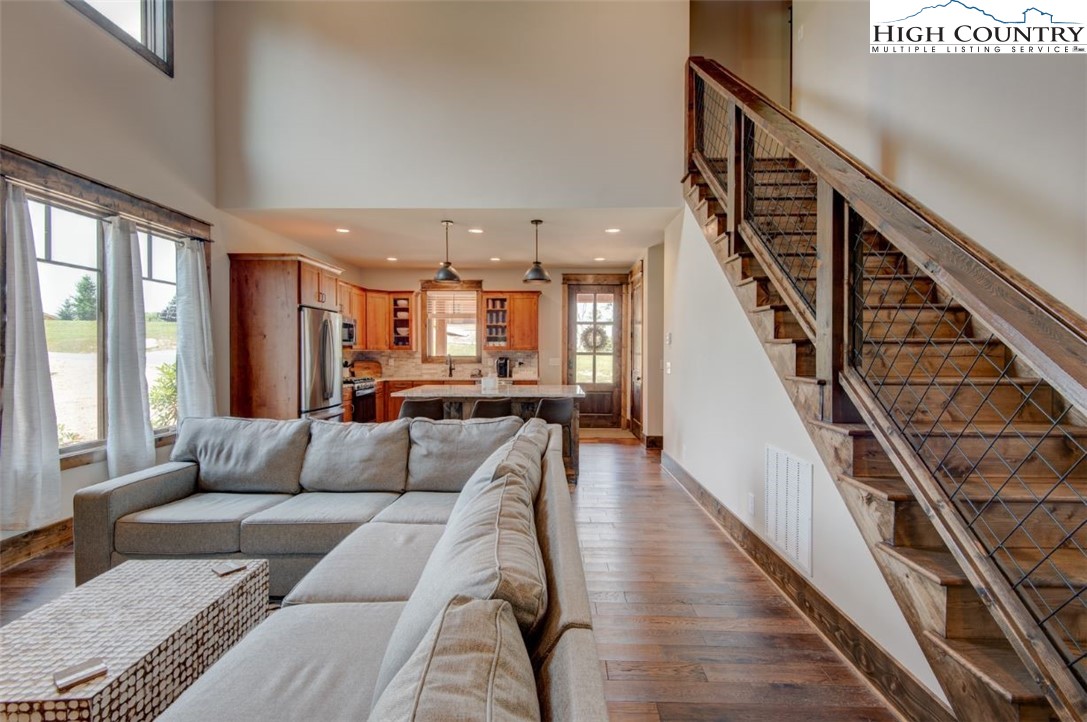 273 High Country Overlook Banner Elk, NC 28604 - Photo 6 of 50 a living room with furniture and wooden floor