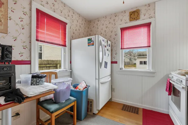 a kitchen with a stove and cabinets