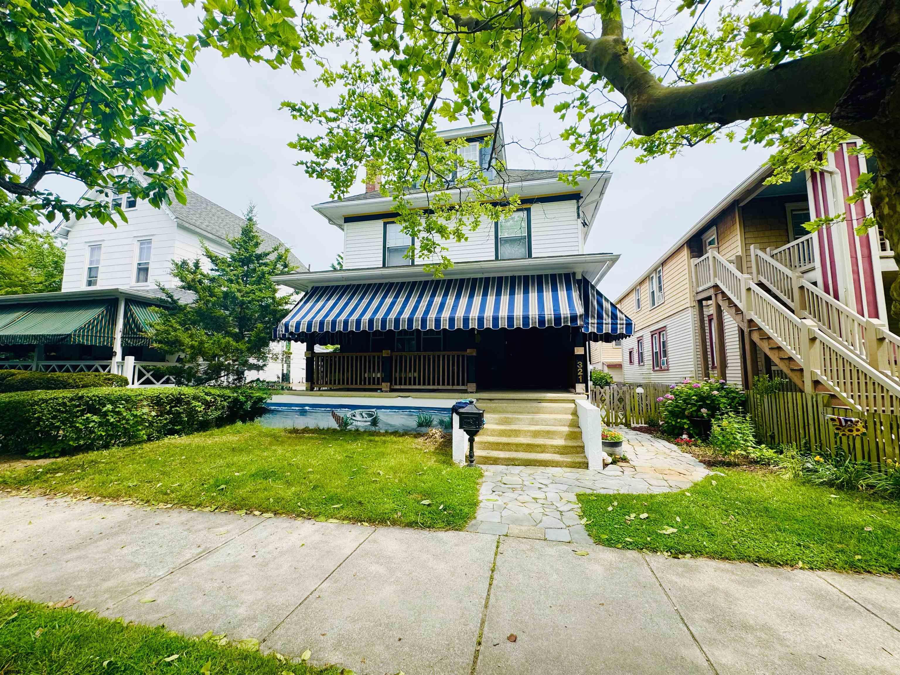 321 Central Avenue Ocean City, NJ 08226 - Photo 1 of 61 a view of a house with a swimming pool
