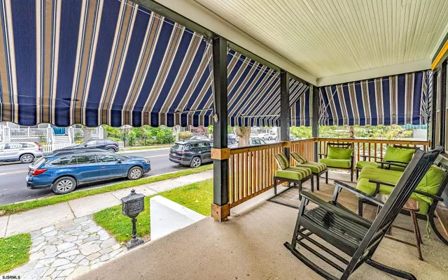 a view of swimming pool with seating area