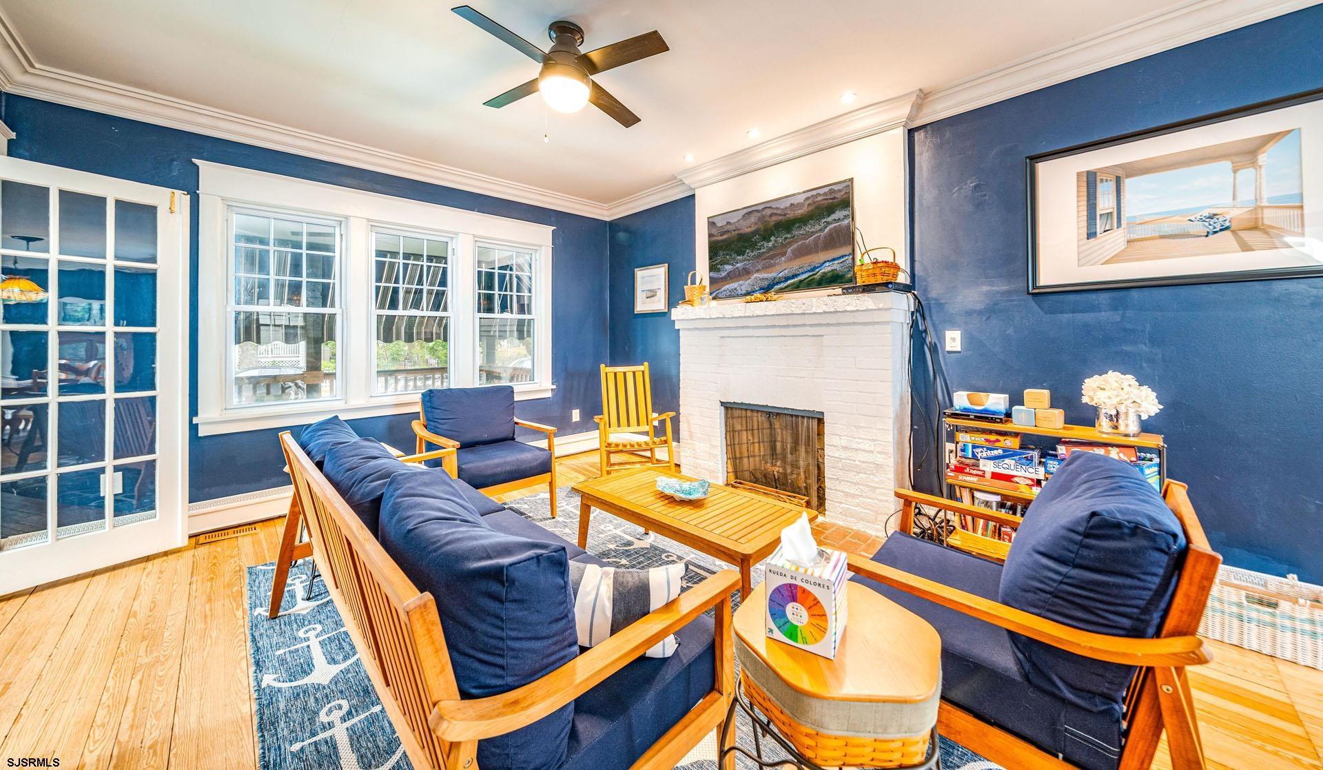 321 Central Avenue Ocean City, NJ 08226 - Photo 8 of 61 a outdoor living space with furniture and a fireplace