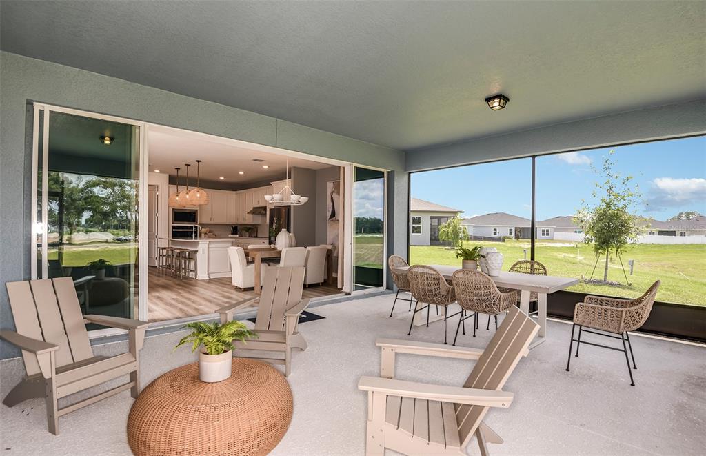 3620 Obsidian Drive Spring Hill, FL 34609 - Photo 21 of 24 a living room with furniture and a large window