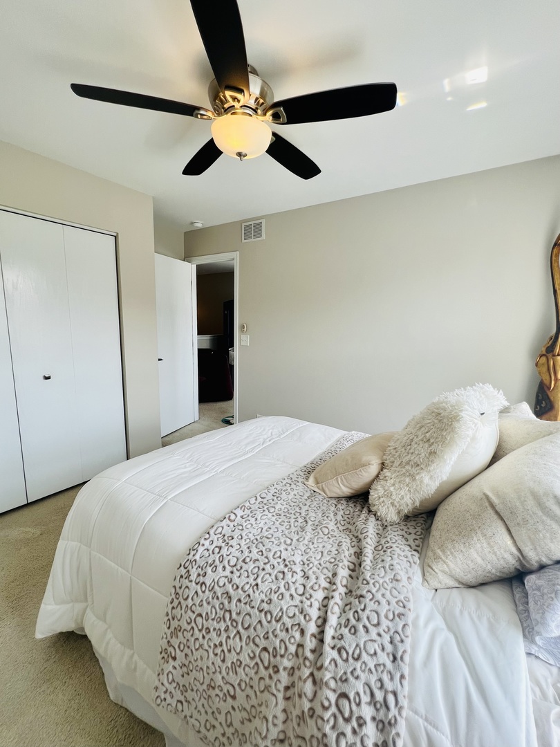 39102 Welsh Lane Beach Park, IL 60083 - Photo 21 of 24 a bedroom with a bed and a ceiling fan