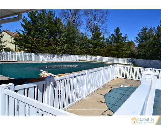5302 Hana Road Edison, NJ 08817 - Photo 10 of 11 a view of deck with patio