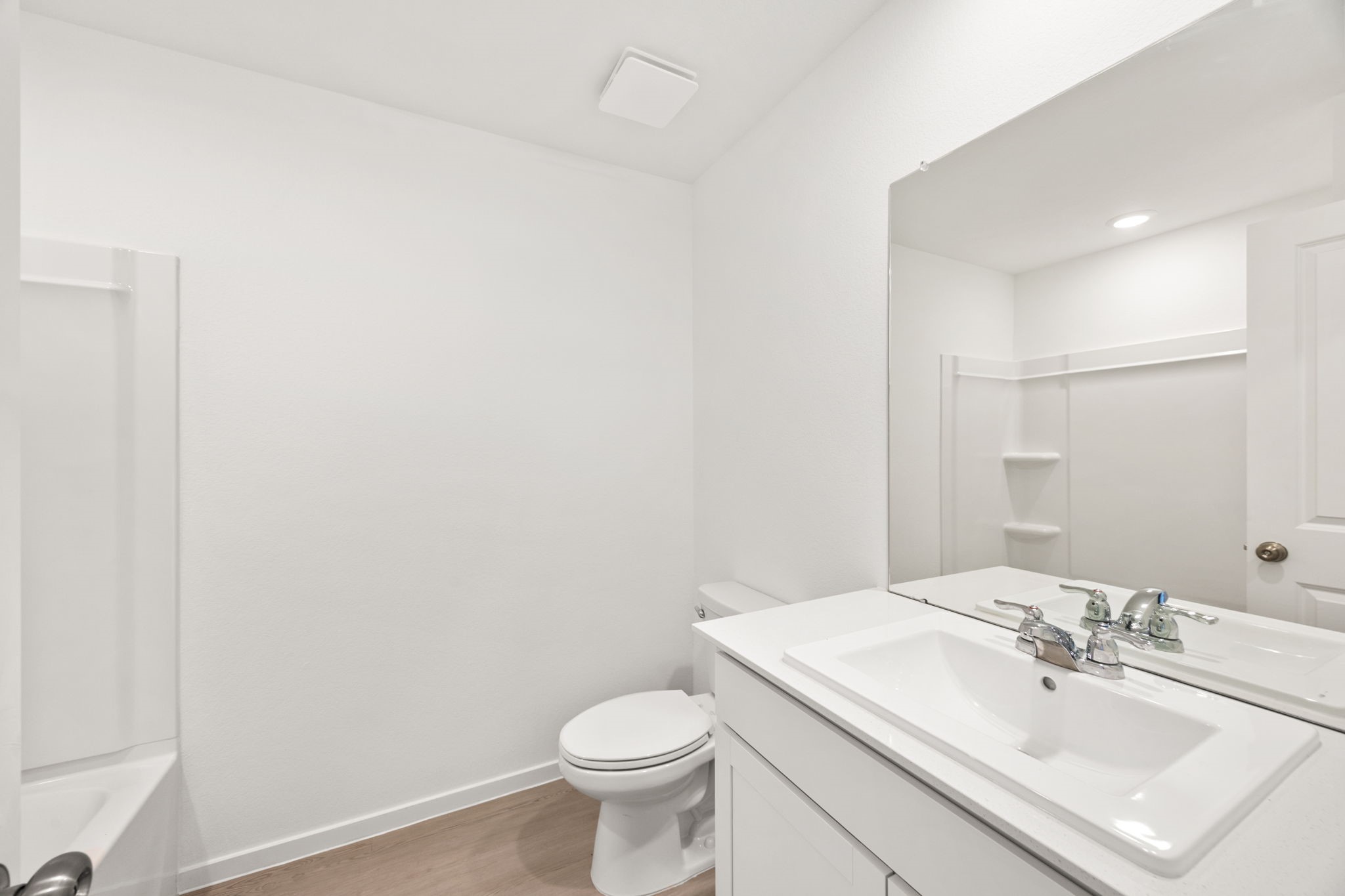 3032 Colusa Rdg Drive Katy, TX 77493 - Photo 16 of 21 a bathroom with a sink a toilet and mirror