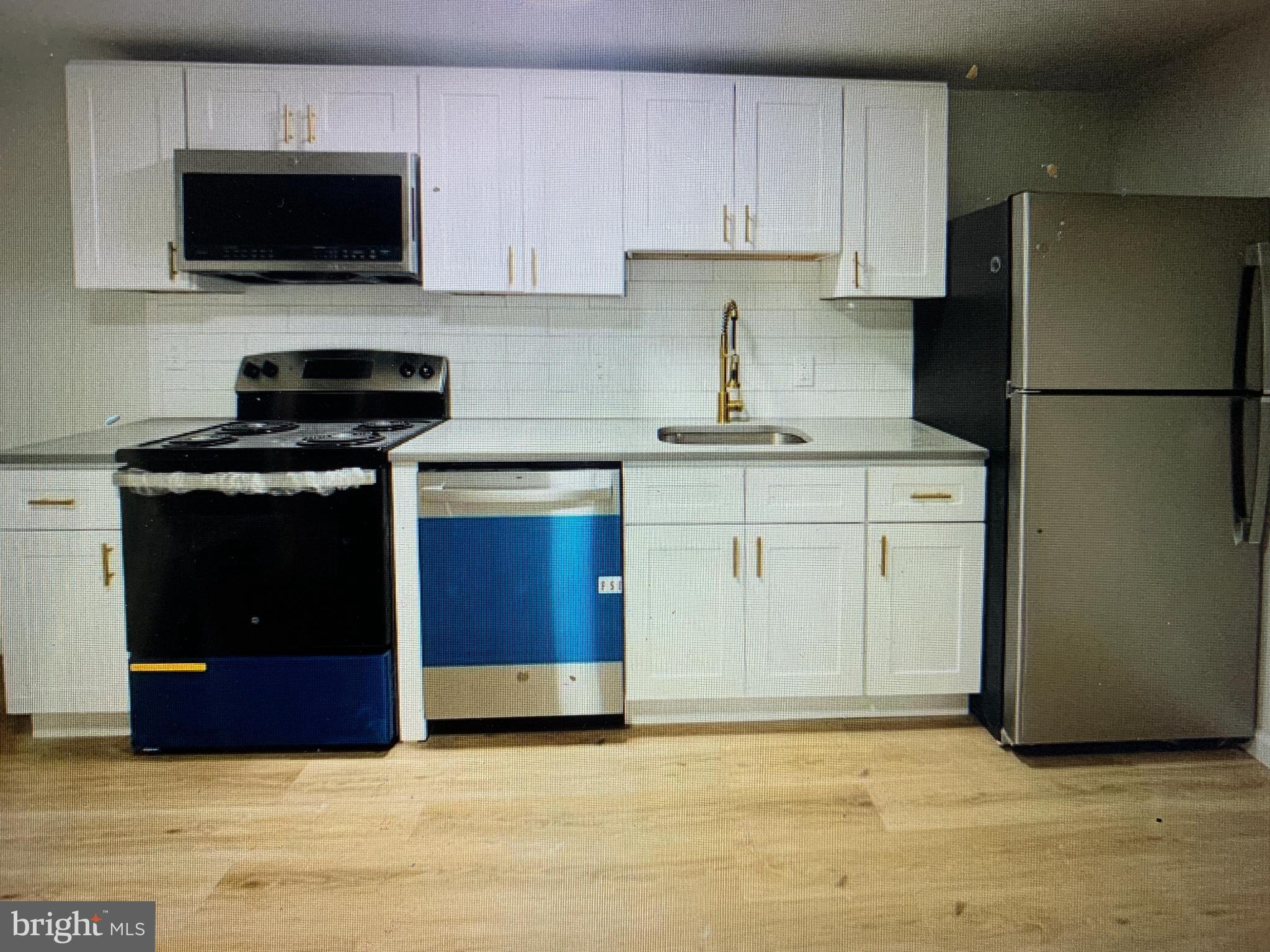 401 Blue Bell Road, Unit C Williamstown, NJ 08094 - Photo 6 of 10 Modern kitchen with sleek appliances.