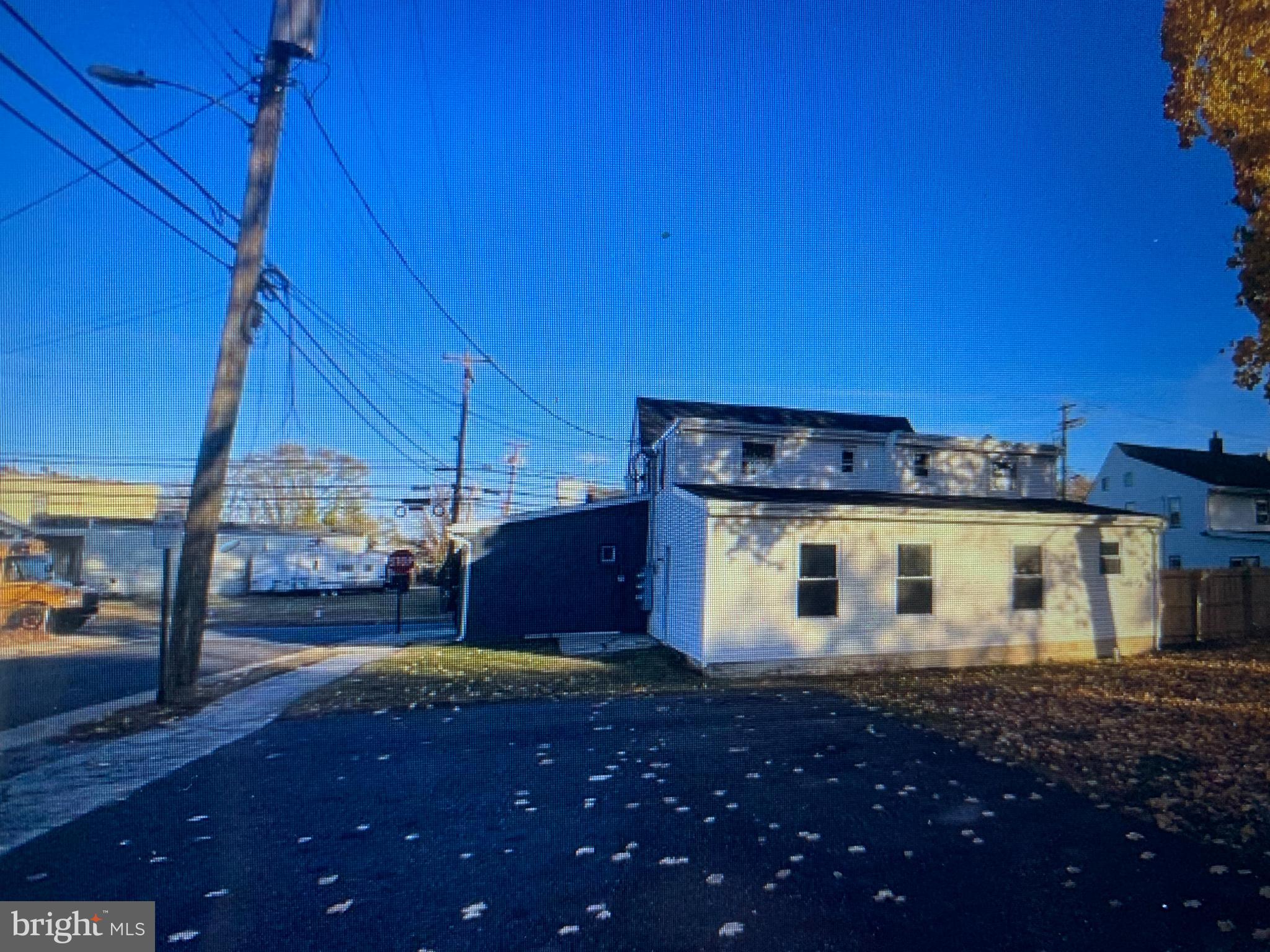 401 Blue Bell Road, Unit C Williamstown, NJ 08094 - Photo 10 of 10 Charming corner lot with clear blue skies.