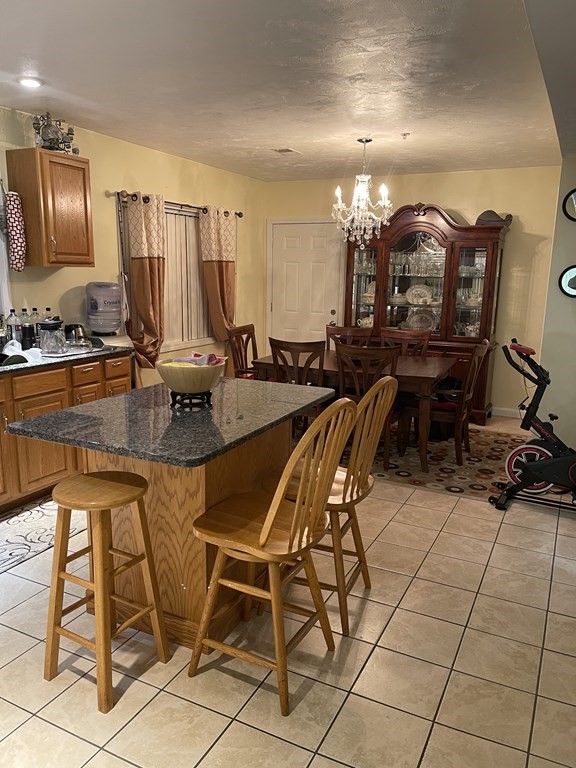 89 West Boylston Street, Unit 3 Worcester, MA 01606 - Photo 2 of 9 a view of a dining room with furniture
