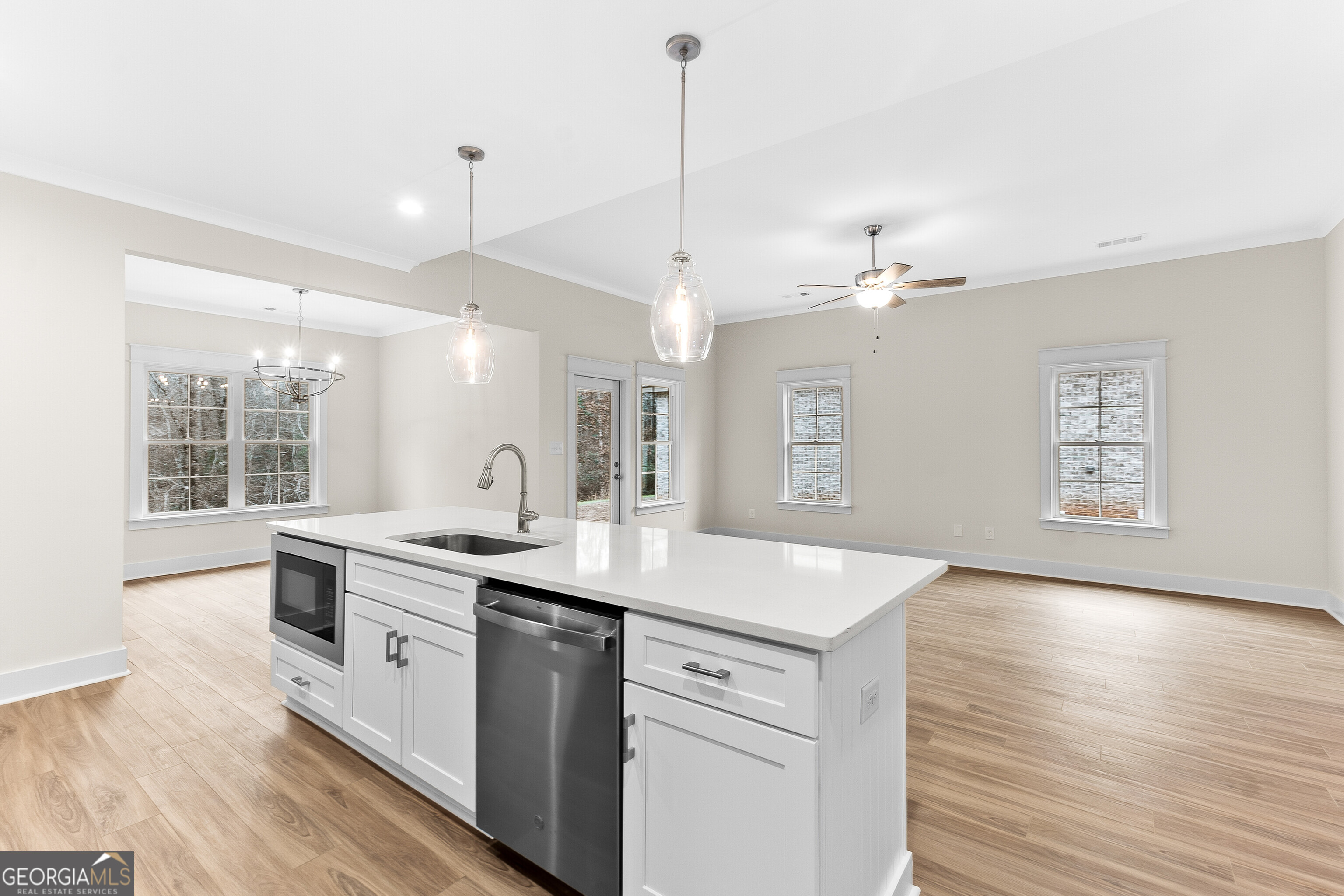 608 Bristleleaf Path Kathleen, GA 31047 - Photo 19 of 48 a kitchen with a sink and stove