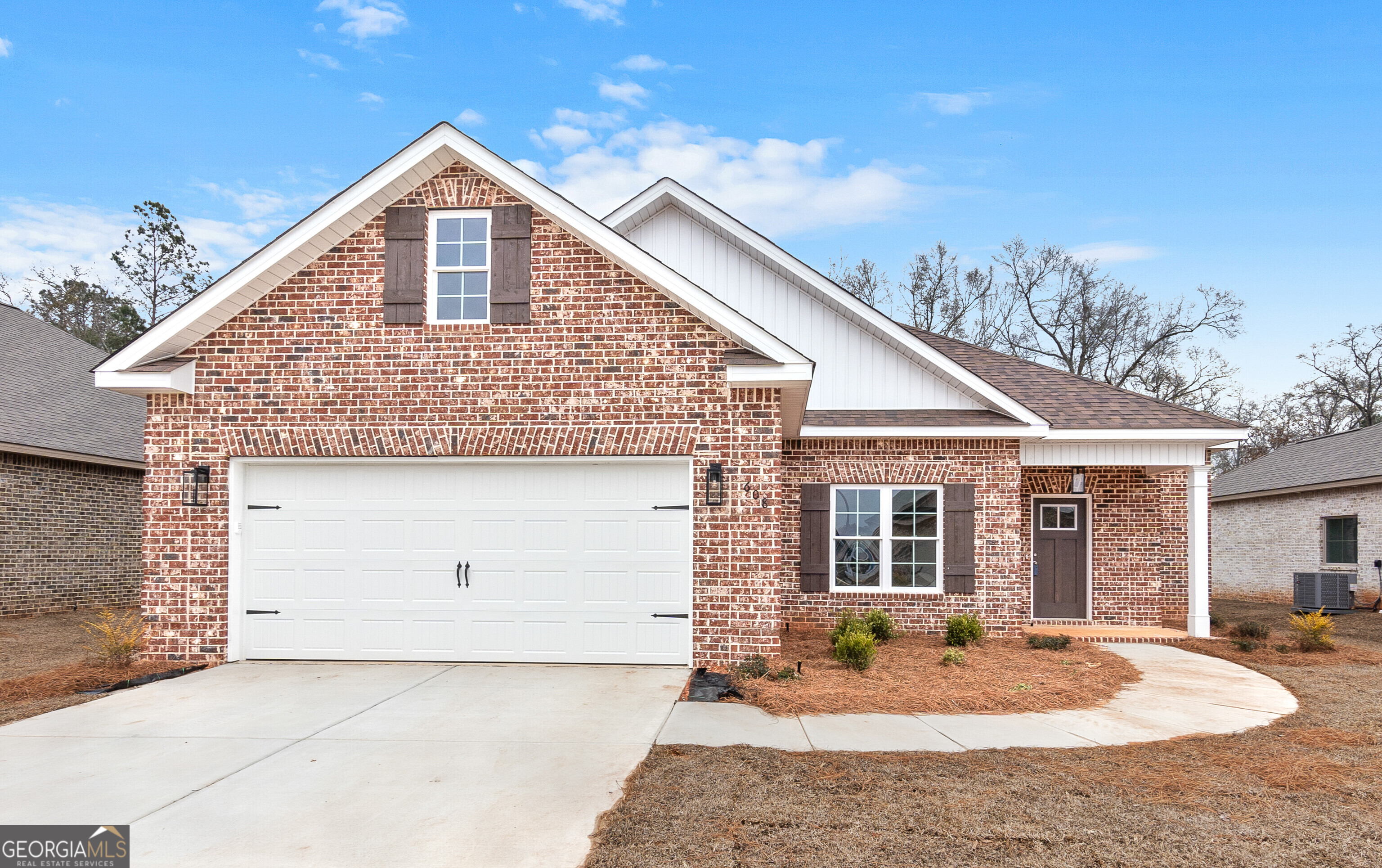 608 Bristleleaf Path Kathleen, GA 31047 - Photo 2 of 48 a front view of a house with yard outdoor seating and barbeque oven