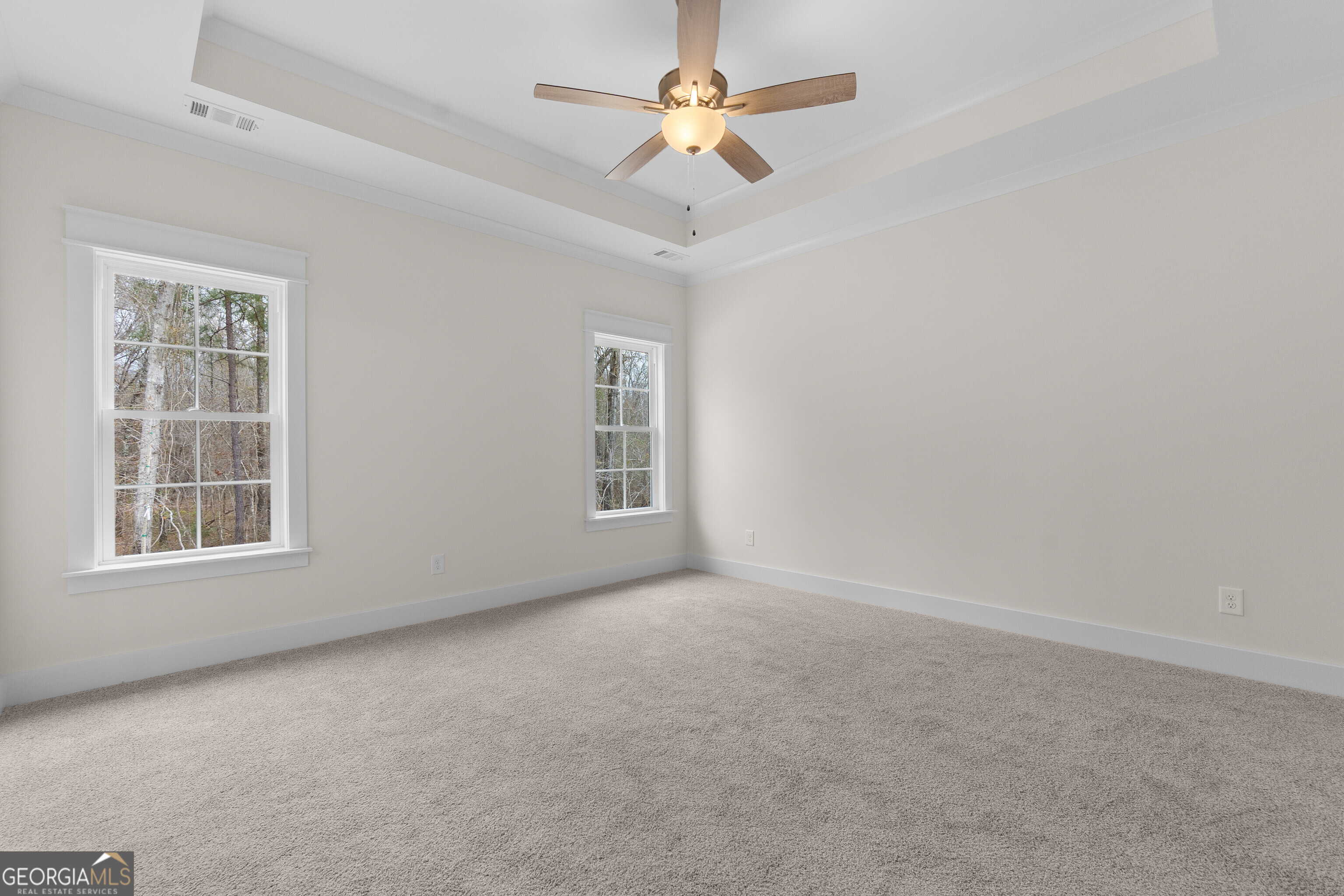 608 Bristleleaf Path Kathleen, GA 31047 - Photo 24 of 48 an empty room with windows and ceiling fan