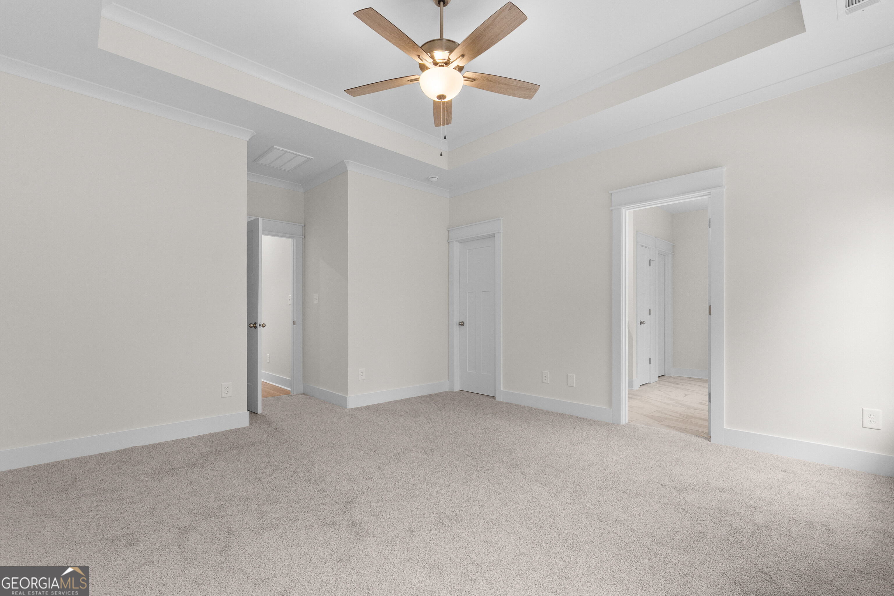 608 Bristleleaf Path Kathleen, GA 31047 - Photo 25 of 48 an empty room with closet and a ceiling fan