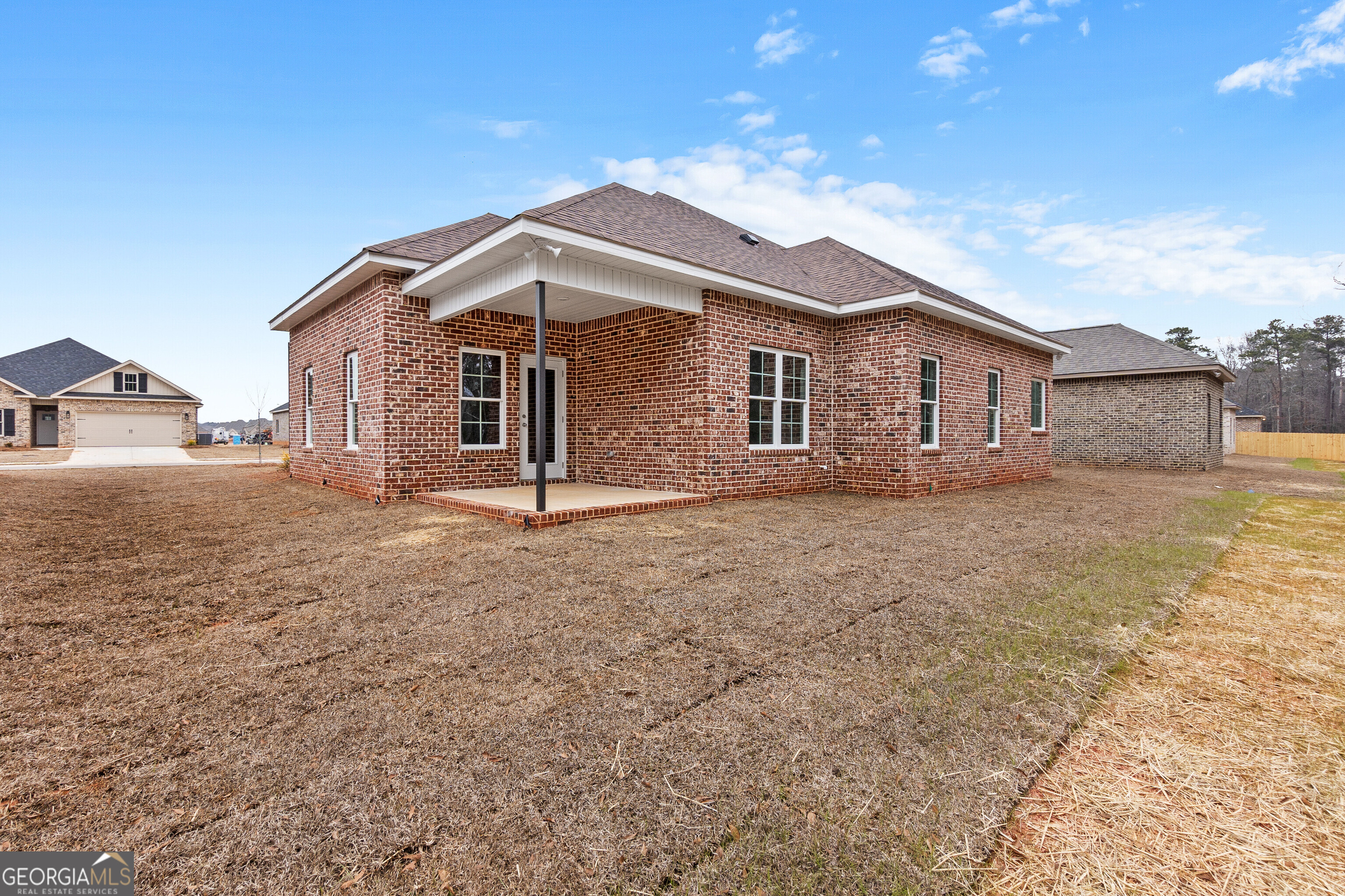 608 Bristleleaf Path Kathleen, GA 31047 - Photo 42 of 48 a view of a house with a yard