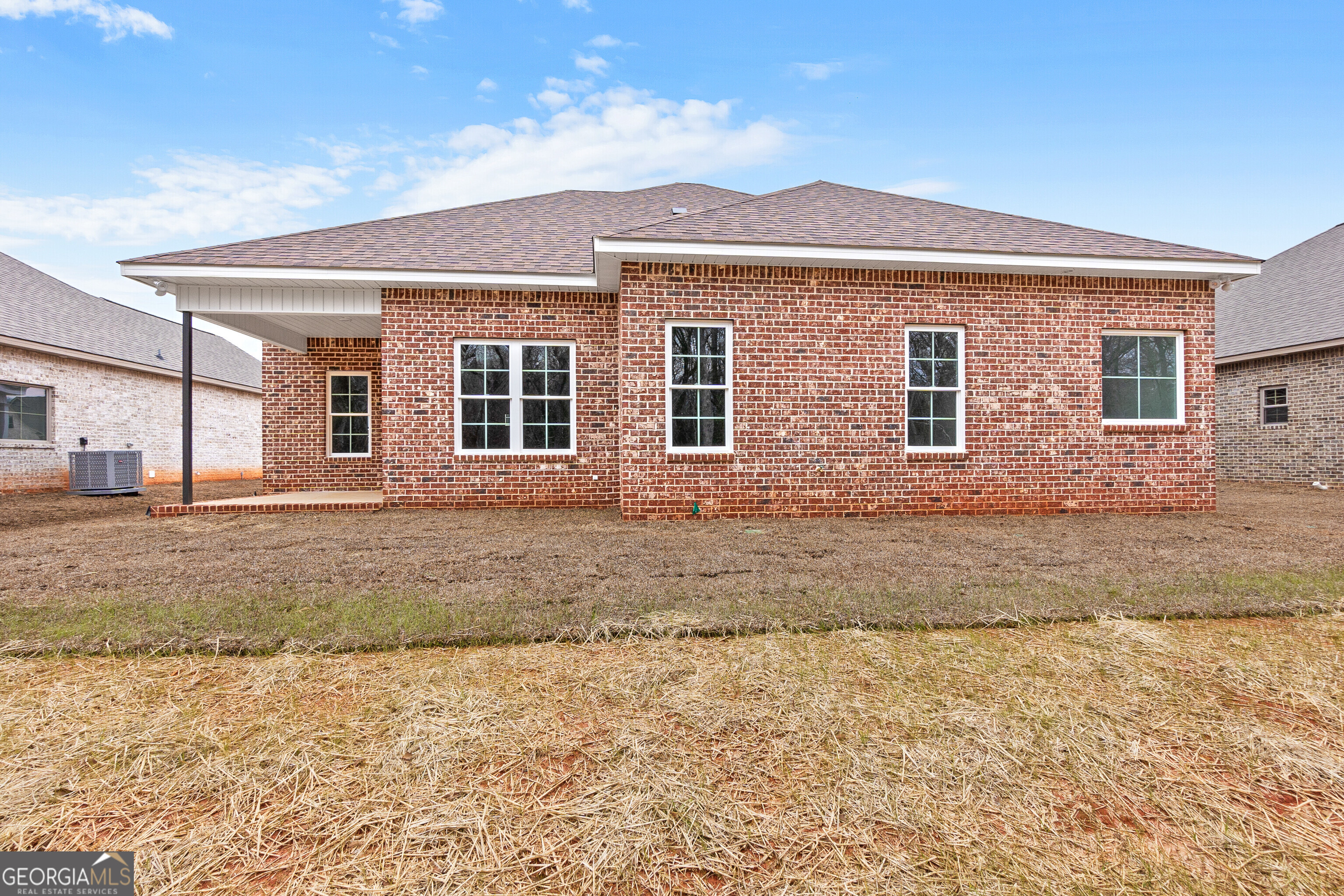 608 Bristleleaf Path Kathleen, GA 31047 - Photo 43 of 48 a front view of a house with garden