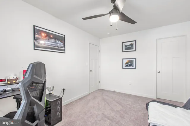 a bathroom with a sink vanity and a mirror