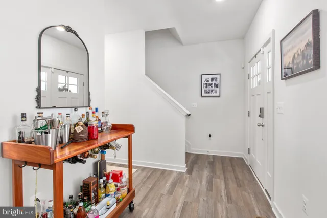a view of a workspace with furniture and a chair