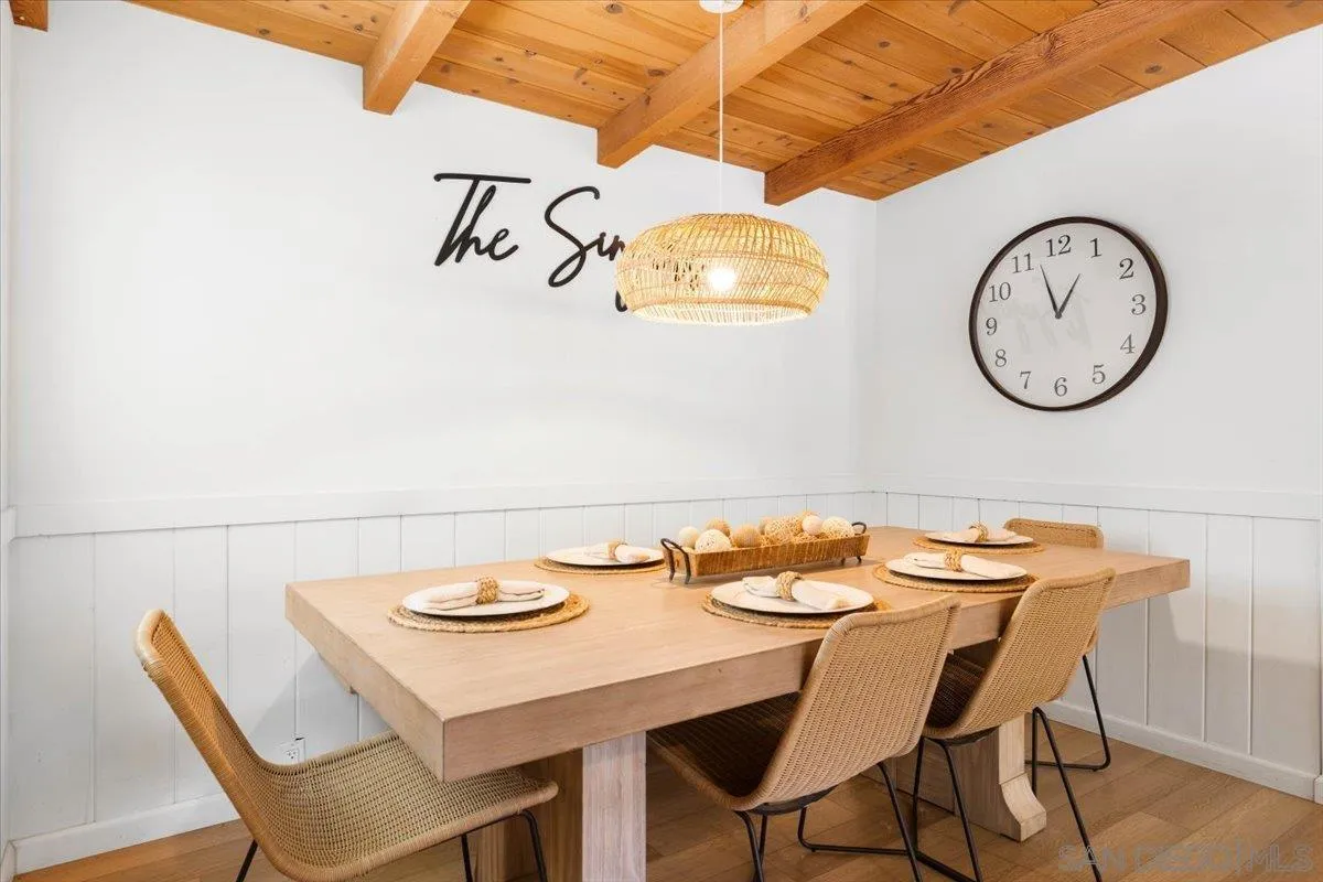 13509 East Lakeview Road Lakeside, CA 92040 - Photo 12 of 43 a dining room with a table and a chair