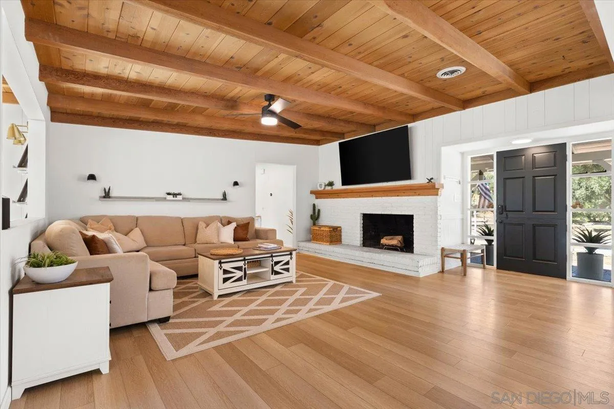 13509 East Lakeview Road Lakeside, CA 92040 - Photo 13 of 43 a living room with furniture and a fireplace