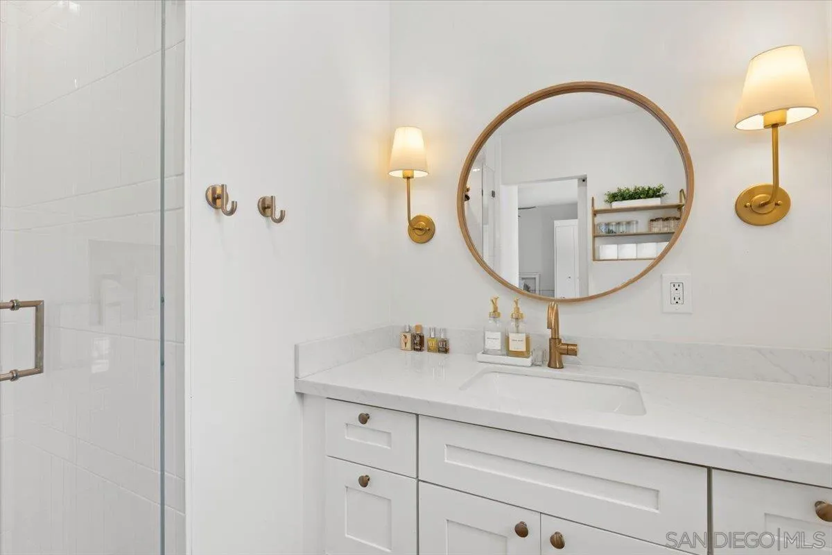 13509 East Lakeview Road Lakeside, CA 92040 - Photo 32 of 43 a bathroom with a sink and a mirror
