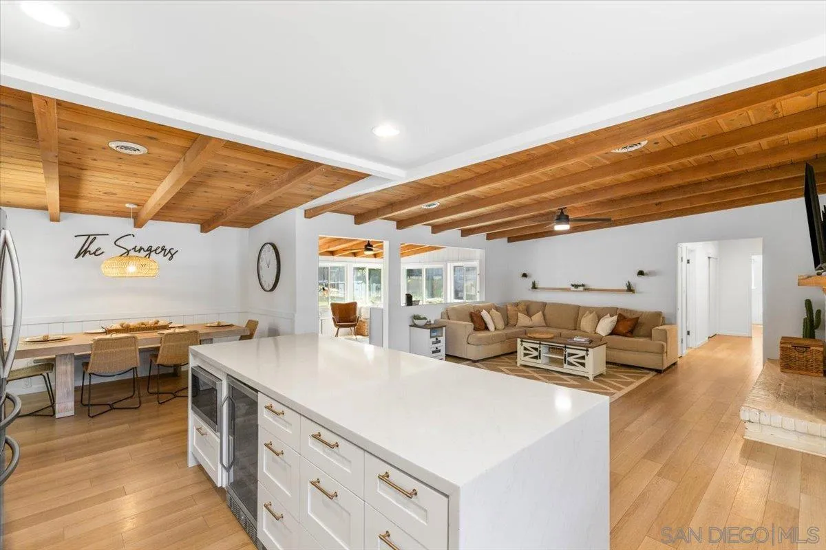 13509 East Lakeview Road Lakeside, CA 92040 - Photo 9 of 43 a large white kitchen with a large window