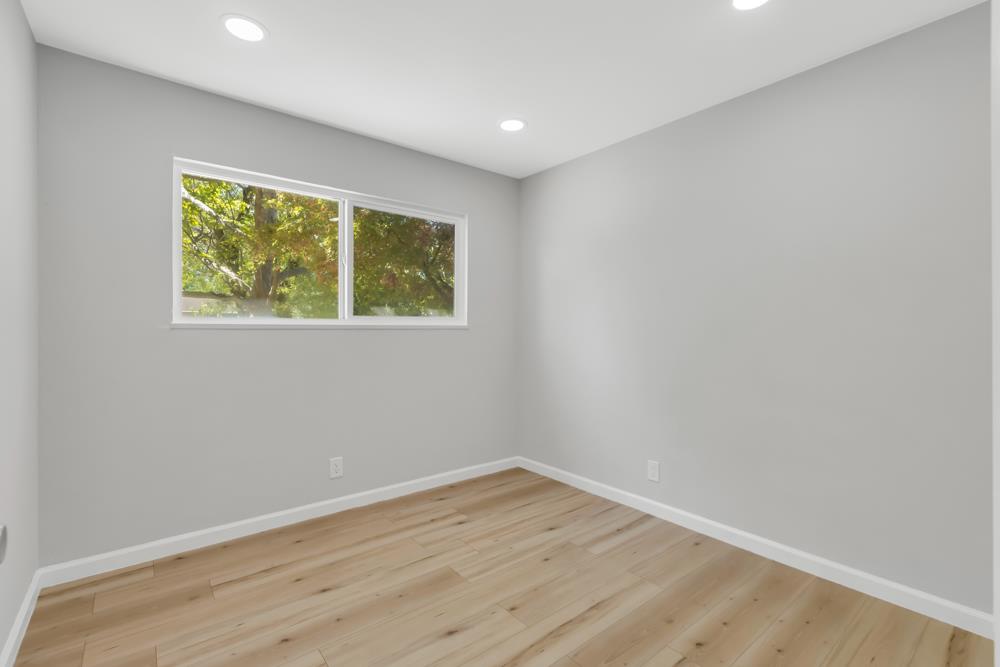 8843 Pershing Avenue Orangevale, CA 95662 - Photo 13 of 29 wooden floor in an empty room with a window