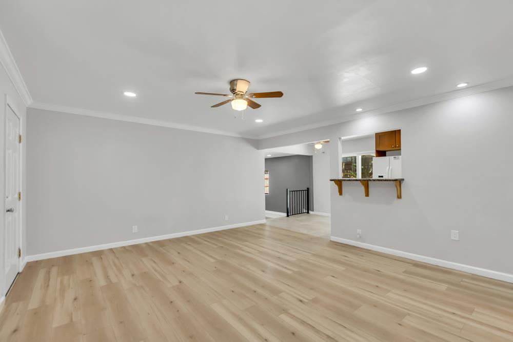 8843 Pershing Avenue Orangevale, CA 95662 - Photo 3 of 29 wooden floor in an empty room with a window