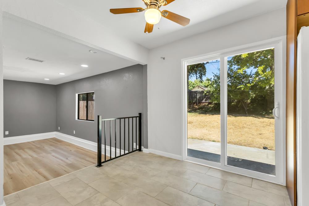8843 Pershing Avenue Orangevale, CA 95662 - Photo 8 of 29 a view of a livingroom with a ceiling fan and window