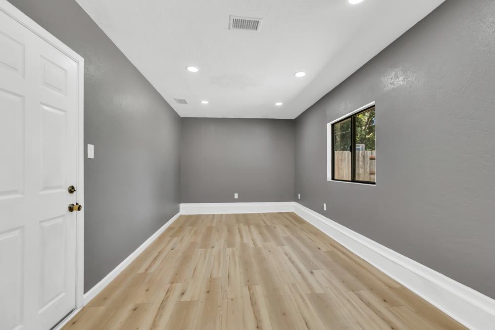 8843 Pershing Avenue Orangevale, CA 95662 - Photo 9 of 29 a view of empty room with wooden floor