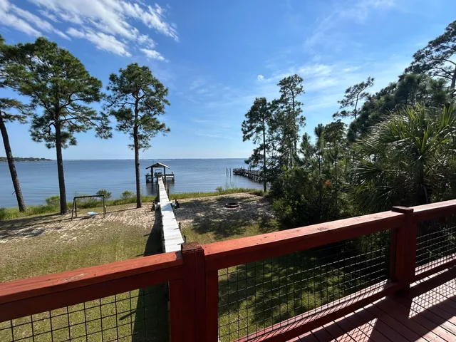 a view of a street with an tree