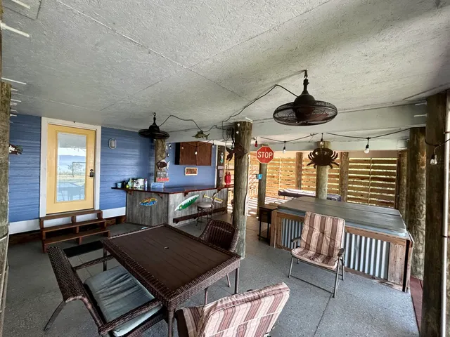 a bedroom with furniture and window