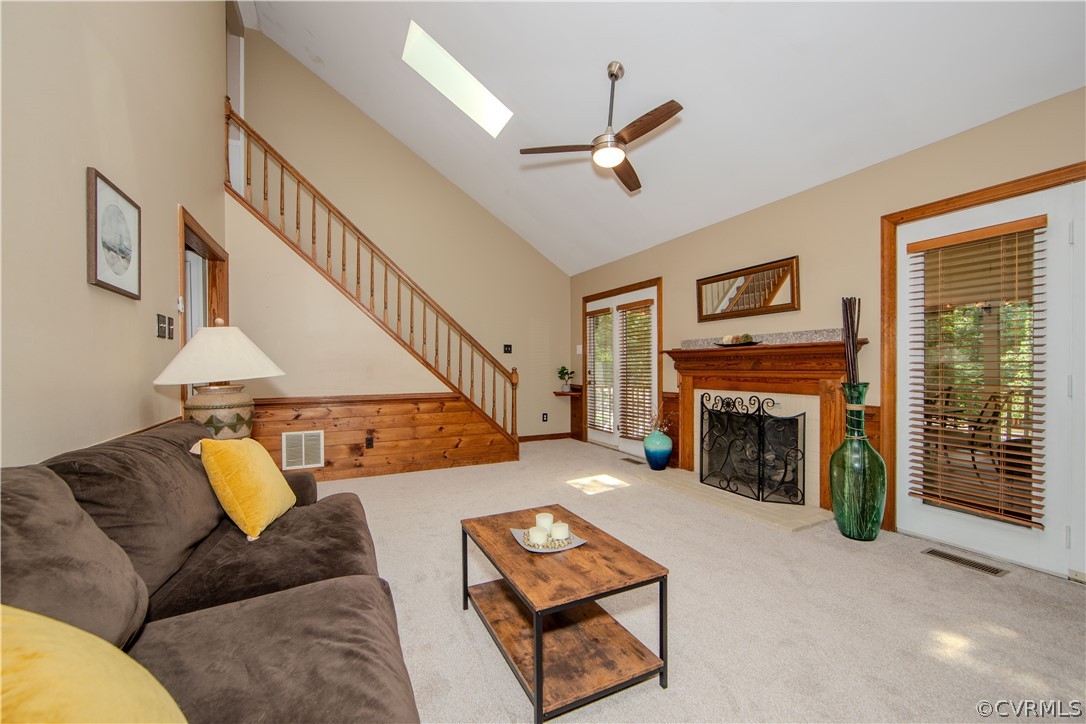 2306 Shadow Ridge Court Midlothian, VA 23112 - Photo 11 of 27 a living room with furniture and a fireplace