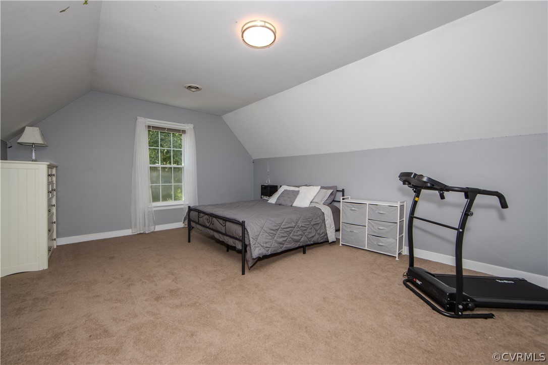 2306 Shadow Ridge Court Midlothian, VA 23112 - Photo 19 of 27 a bedroom with a bed and a window