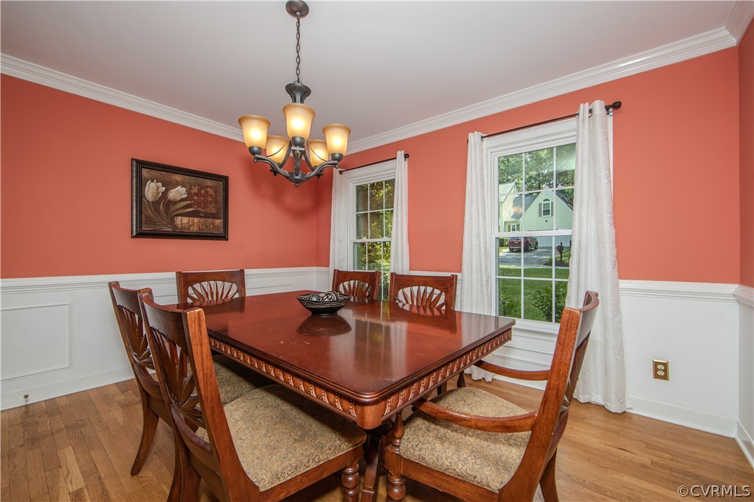 2306 Shadow Ridge Court Midlothian, VA 23112 - Photo 4 of 27 a view of a dining room with furniture window and wooden floor
