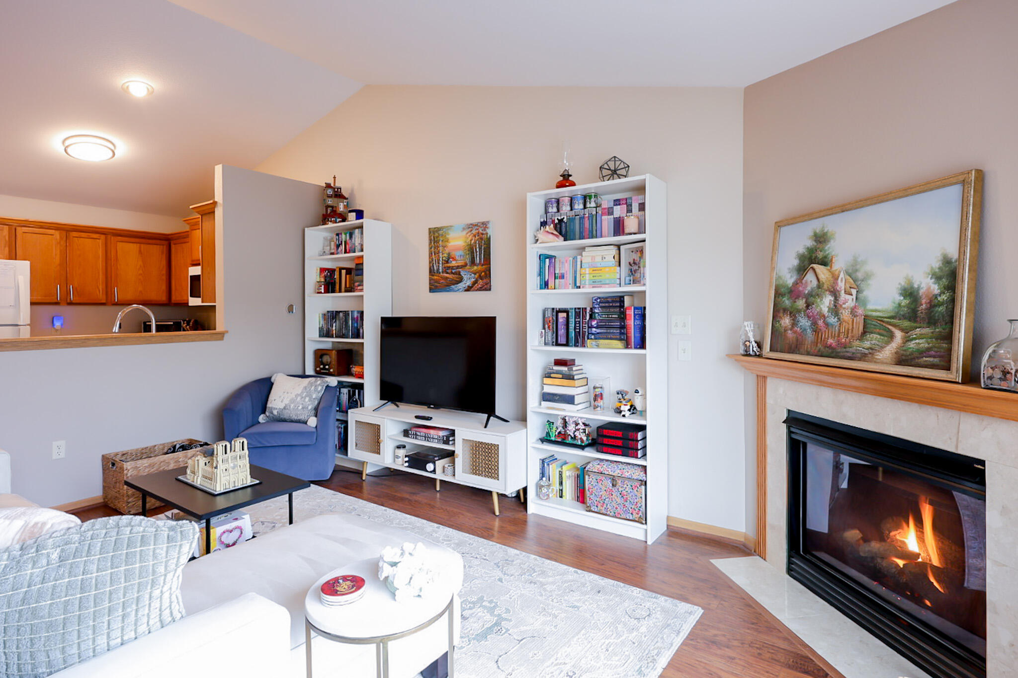 Beautiful gas fireplace and cathedral ceiling