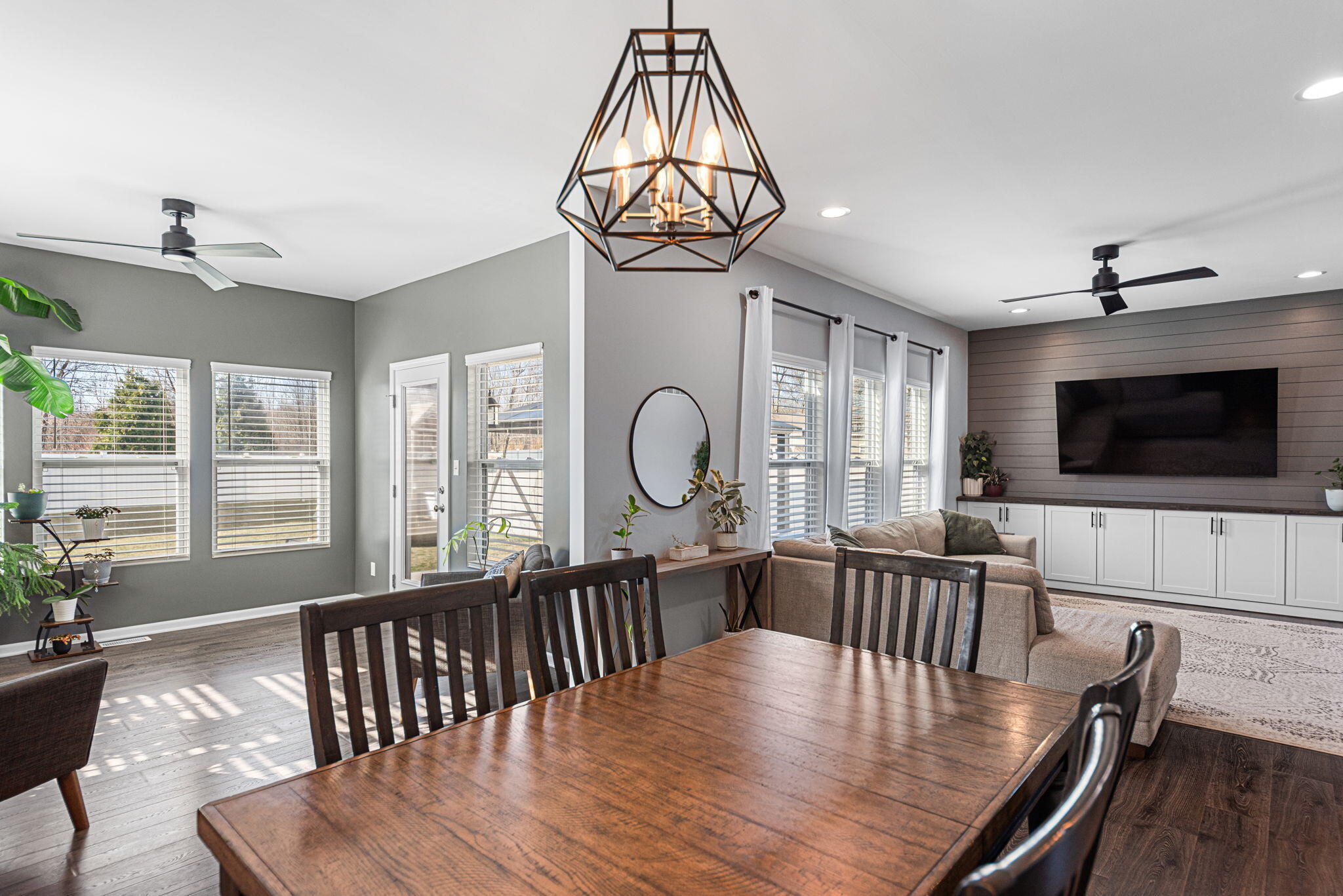 2143 West 132nd Place Crown Point, IN 46307 - Photo 13 of 35 a view of a dining room with furniture window and wooden floor