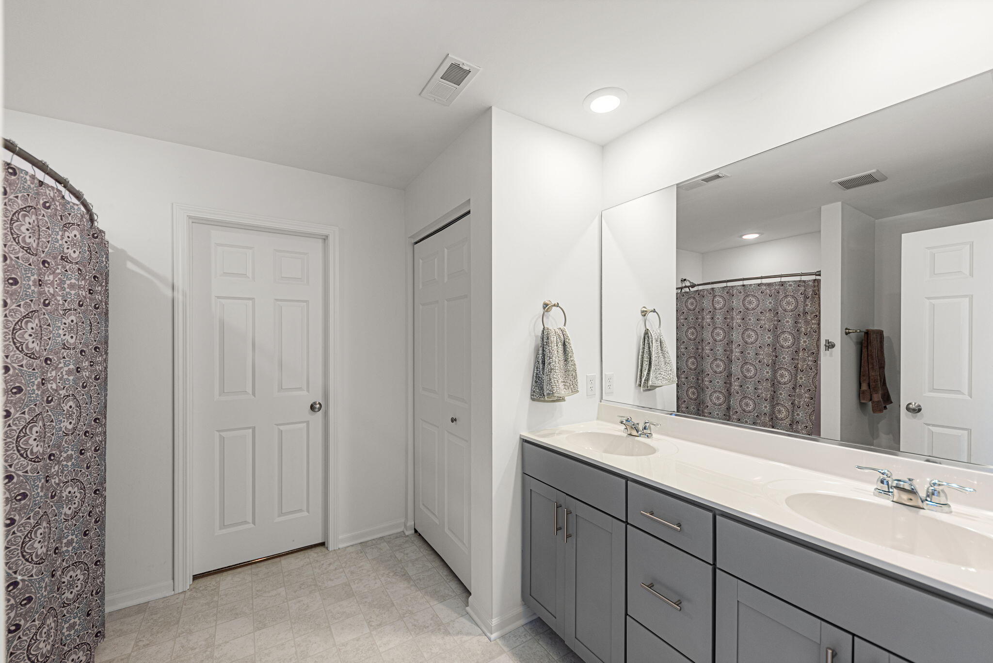 2143 West 132nd Place Crown Point, IN 46307 - Photo 19 of 35 a bathroom with double vanity sink and a mirror