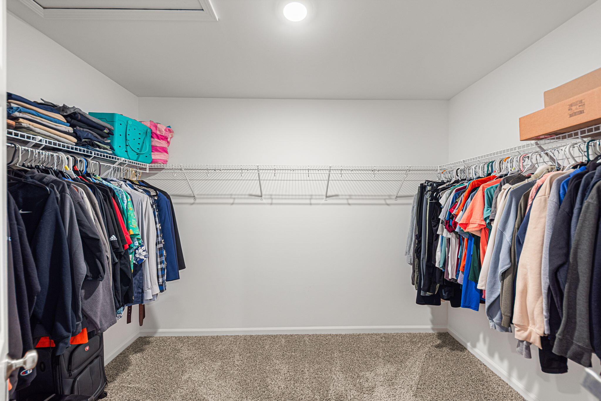 2143 West 132nd Place Crown Point, IN 46307 - Photo 20 of 35 a view of walk in closet with clothes