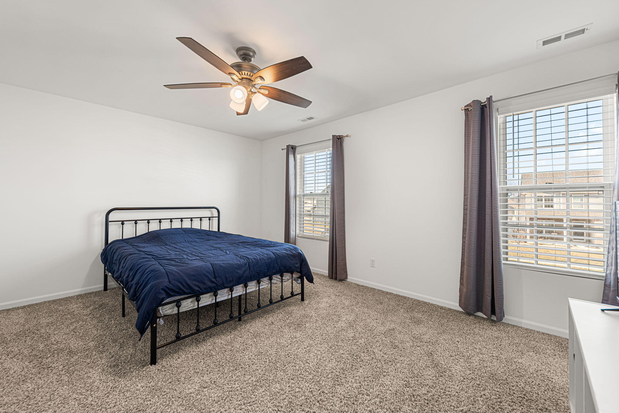 2143 West 132nd Place Crown Point, IN 46307 - Photo 21 of 35 a bedroom with a bed and window