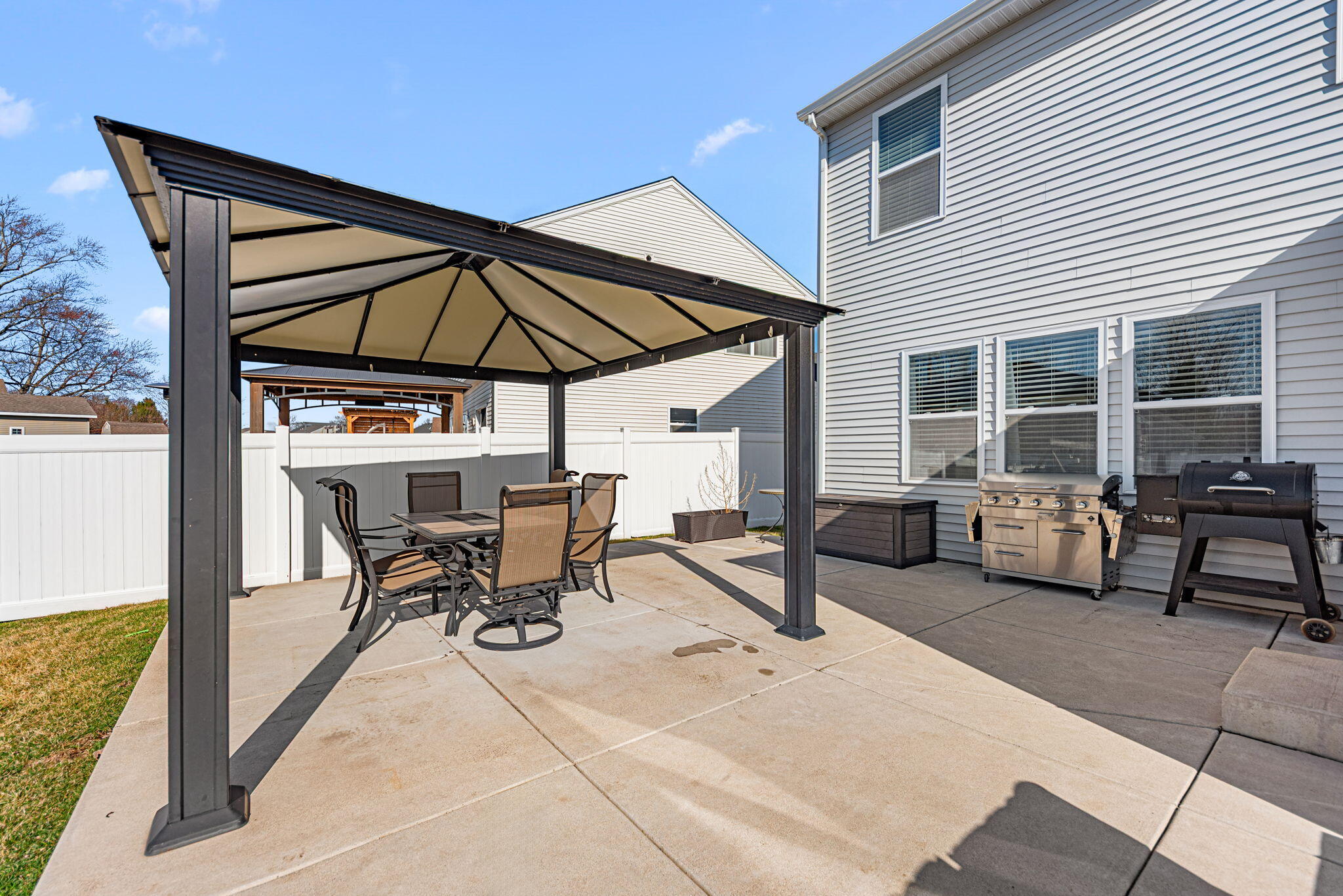 2143 West 132nd Place Crown Point, IN 46307 - Photo 30 of 35 a view of a dinning table and chairs in the patio