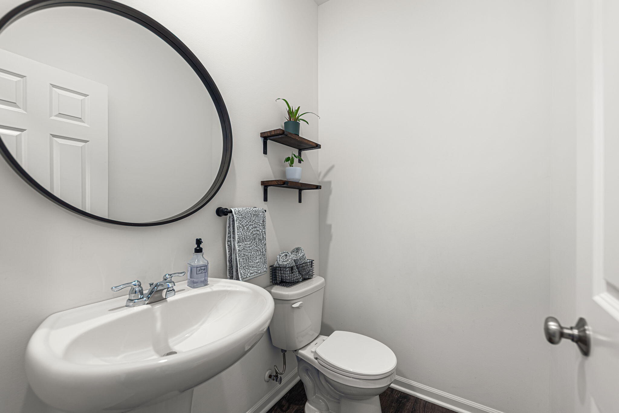2143 West 132nd Place Crown Point, IN 46307 - Photo 7 of 35 a bathroom with a sink and a mirror