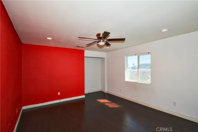 a bathroom with a toilet a sink and shower