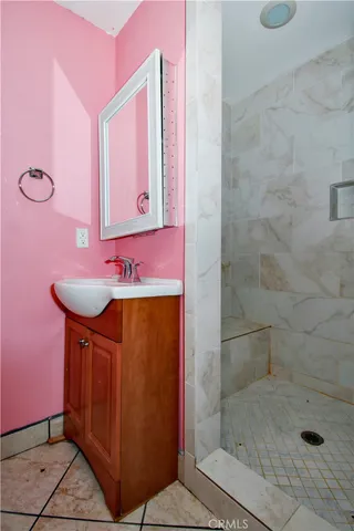 a bathroom with a toilet and a bath tub