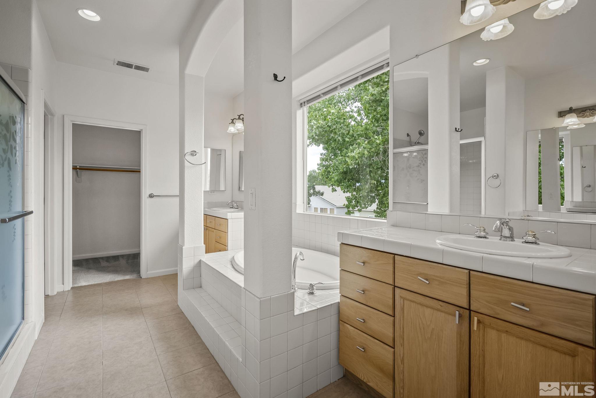 1722 Back Country Court Reno, NV 89521 - Photo 20 of 33 a bathroom with a sink and a mirror