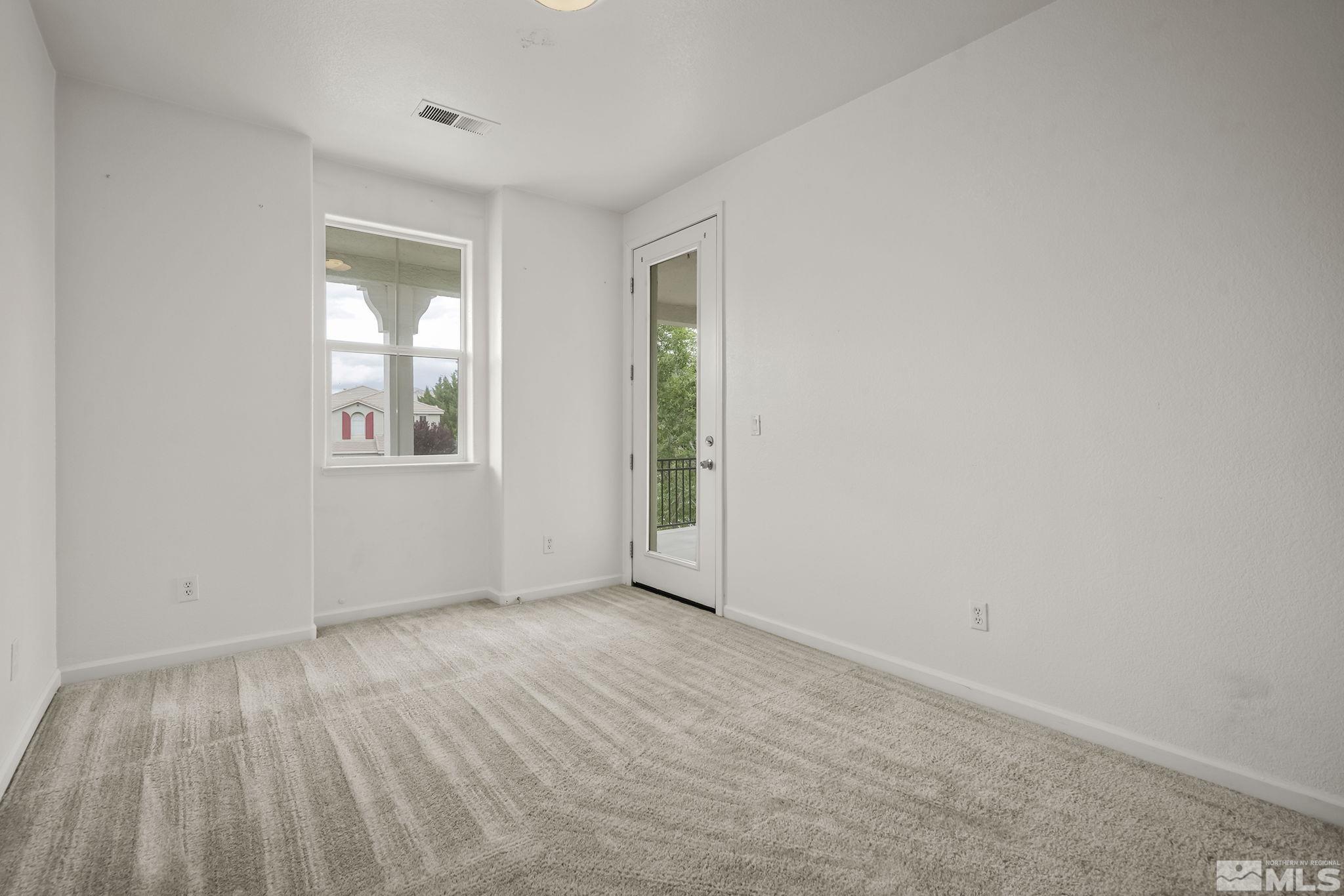 1722 Back Country Court Reno, NV 89521 - Photo 23 of 33 wooden floor in an empty room with a window