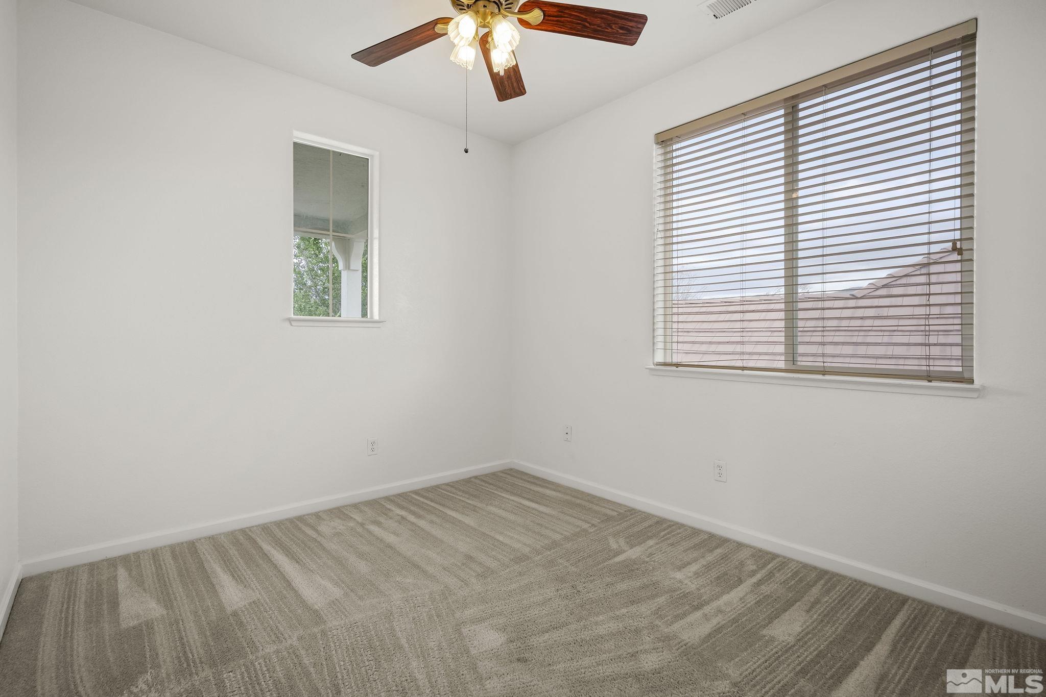 1722 Back Country Court Reno, NV 89521 - Photo 25 of 33 an empty room with a window