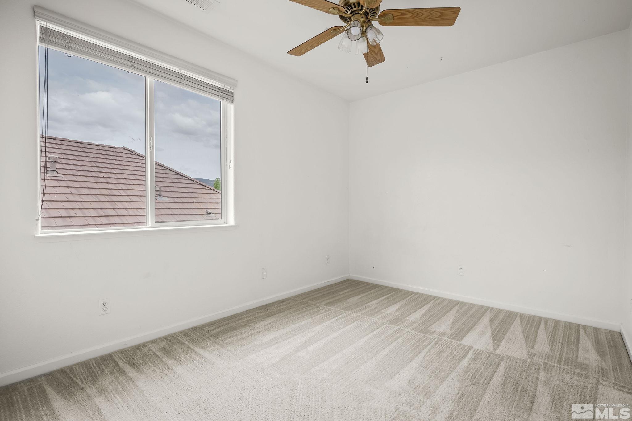 1722 Back Country Court Reno, NV 89521 - Photo 27 of 33 a view of an empty room with a window