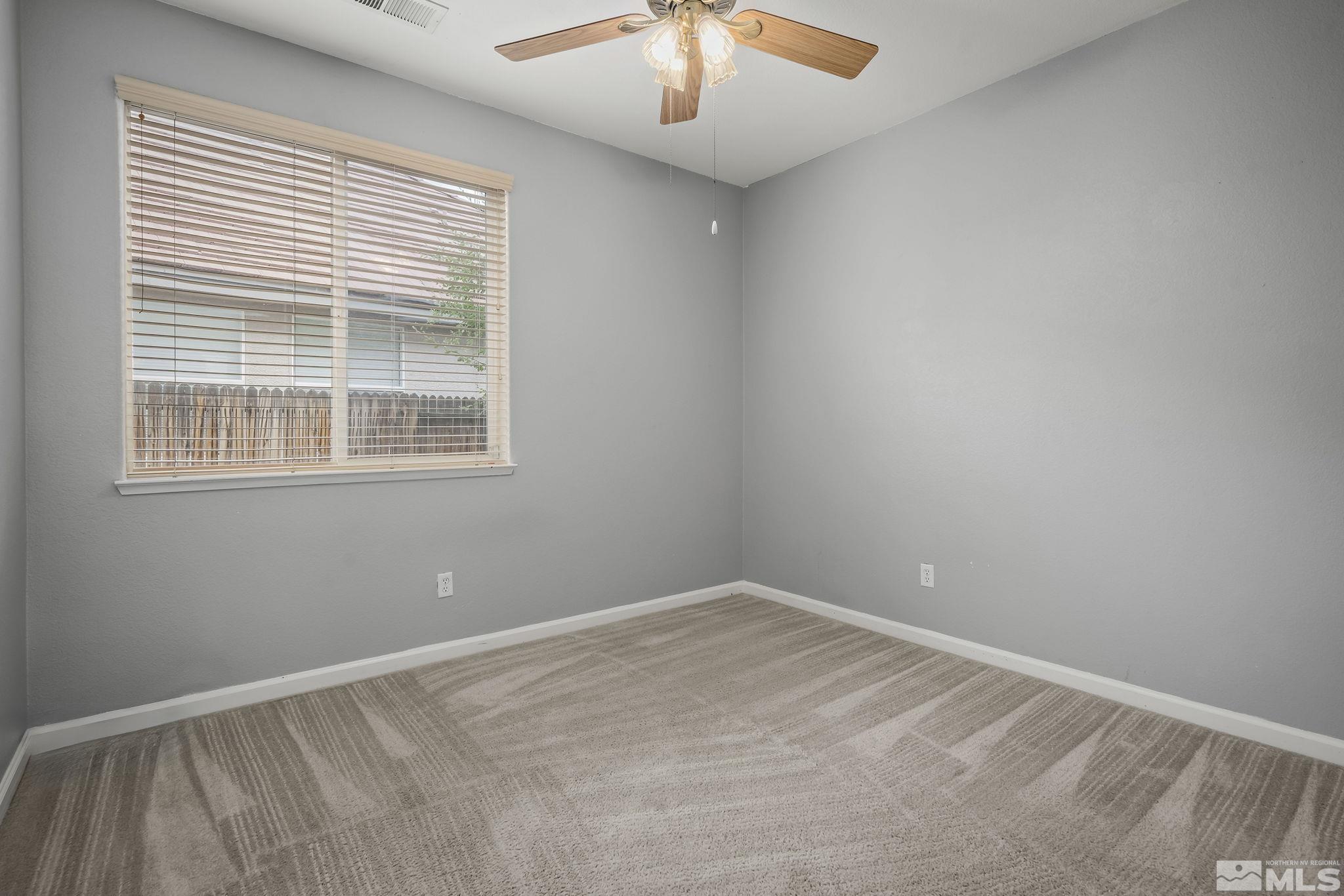 1722 Back Country Court Reno, NV 89521 - Photo 28 of 33 an empty room with a window